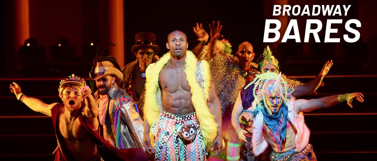 Performers in colorful costumes on stage for Broadway Bares