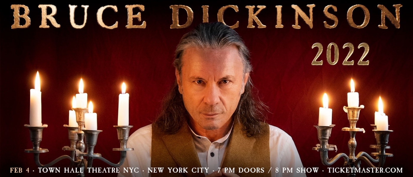 Bruce Dickinson surrounded by candles in old-fashioned candelabras, underneath the words "An Evening with Bruce Dickinson 2022"