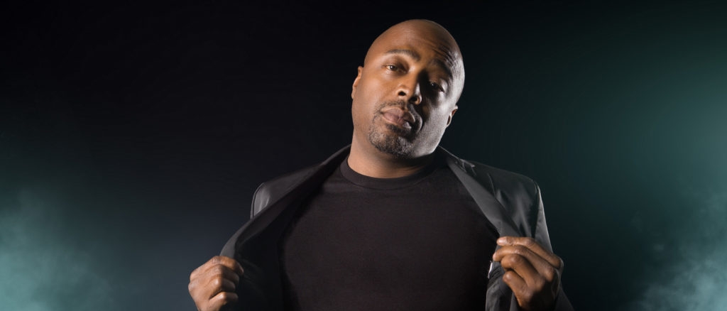 Donnell Rawlings in front of a foggy background