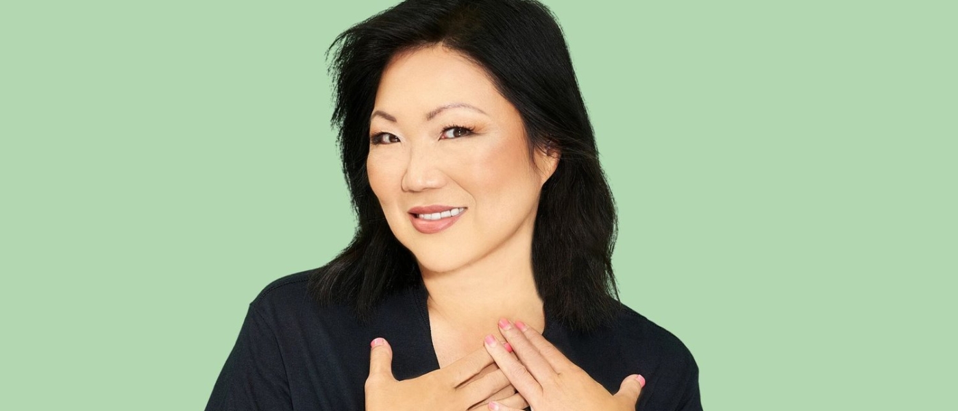 Margaret Cho with her hands pressed to her chest