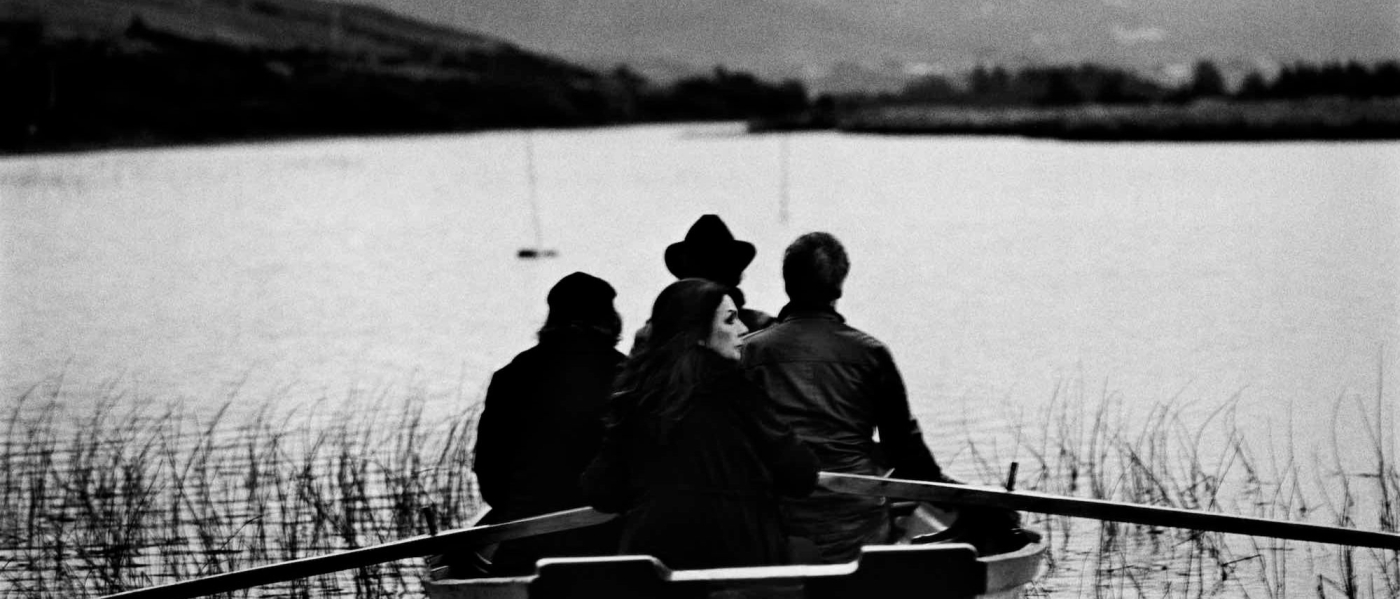 Black and white photo of Clannad in a boat