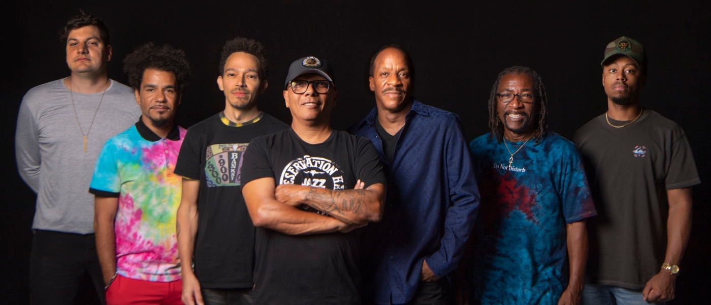 The members of Dumpstaphunk standing in a line