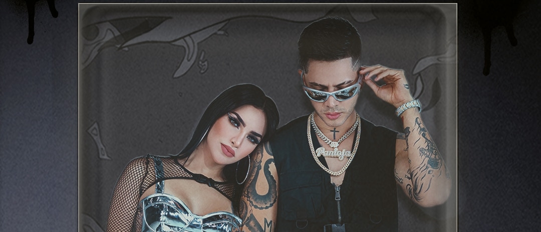 Kim Loazie in a mesh shirt and silver bustier next to JD Pantoja in a zipped tank top and gold chains. Text reads "Bye Bye Tour" with a silver broken heart between "bye" and "bye"