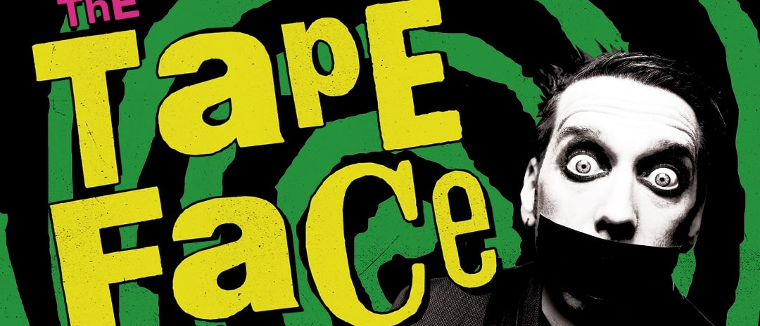 A black and white image of a man with very wide eyes and black tape over his mouth, in front of a messy green and black spiral background and large yellow and pink lettering reading "The Tape Face Show"