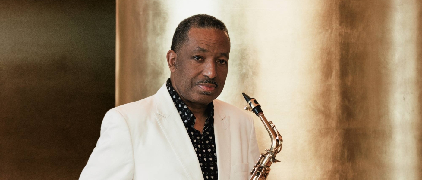 Donald Harrison holding a saxophone