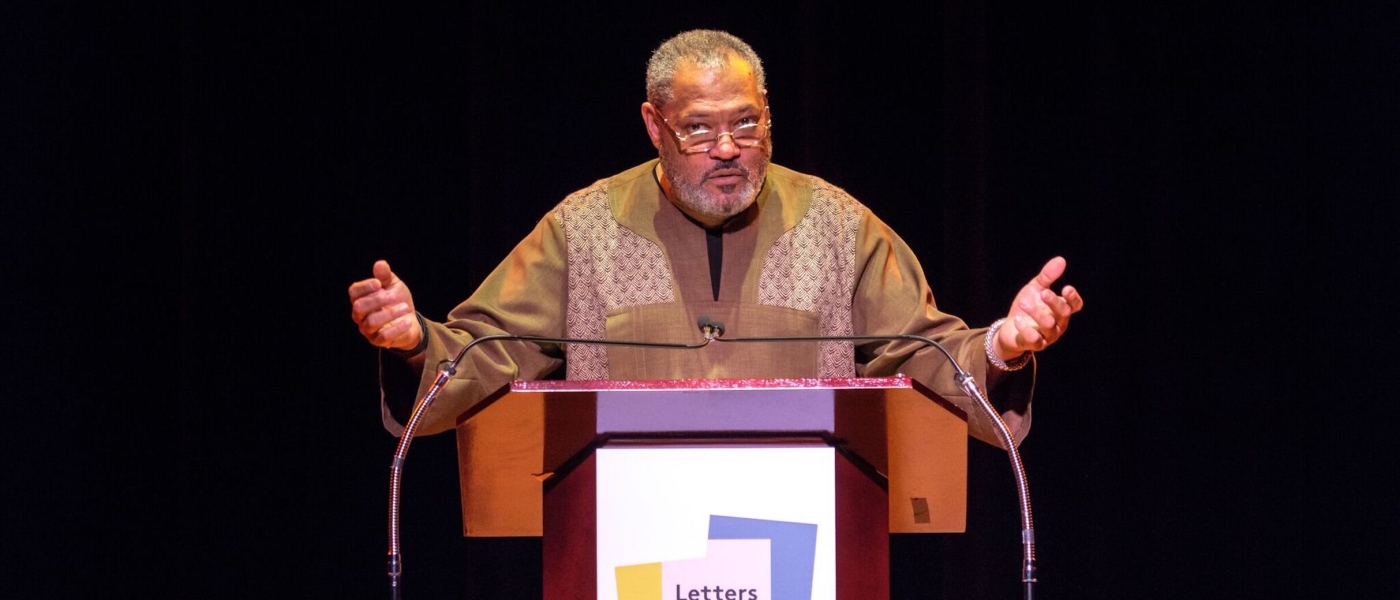 Laurence Fishburne at a podium for Letters Live