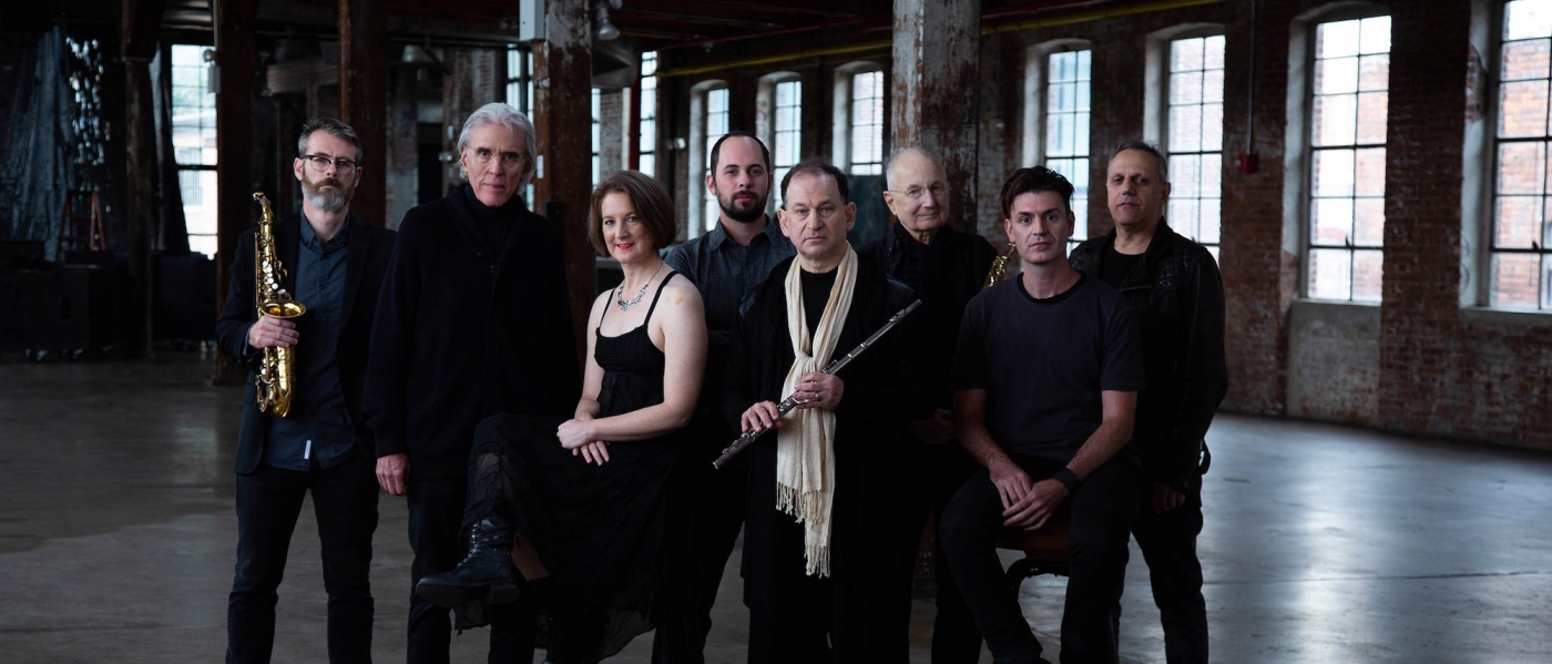 Promotional photo of the Philip Glass Ensemble 