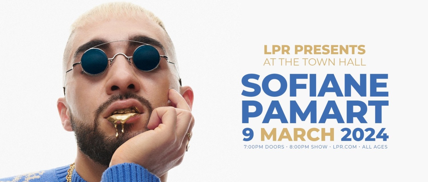 Sofiane Pamart wearing small fashion sunglasses with liquid gold spilling out of his mouth